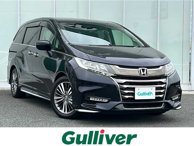 ホンダ オデッセイ アブソルート ホンダセンシング 福岡県 2017(平29)年 5.2万km プレミアムヴィーナスブラックP 純ナビVXM-184VFi(AM/FM/CD/DVD/ワンセグTV/USB/SD/BT)/バックカメラ/社外前方ドライブレコーダー/ビルトインETC/ホンダセンシング/・衝突軽減ブレーキ/・車線逸脱警報/・クルーズコントロール追従あり/両側パワースライドドア/D席パワーシート/オートライト/フォグランプ/電動格納ミラー/ステアリングスイッチ/パドルシフト/プッシュスタート/純正ドアバイザー/後席サンシェード/ISOFIX/W+サイド+カーテンエアバック