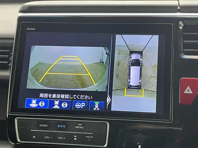 ホンダ ステップワゴン スパーダ ハイブリッド G EX ホンダセンシング 岡山県 2019(平31)年 5.7万km プラチナホワイトパール 純正10インチナビ/（CD/DVD/BT/フルセグTV/HDMI）/フリップダウンモニター/アラウンドビューモニター/両側パワースライドドア/シートヒーター(D/N)/ビルトインETC/レーダークルーズコントロール/LEDヘッドライト/LEDフォグランプ/オートライト/オートブレーキホールド/純正ドライブレコーダー（前）/純正フロアマット/純正ドアバイザー/TVキャンセラー/ISOFIX/リアサーキュレーター/後席サンシェイド/ステアリングスイッチ/チルトステアリング/シートリフター/シートバックテーブル/ウインカーミラー/ドアバイザー/取扱説明書