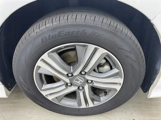 ホンダ ステップワゴン スパーダ ハイブリッド G EX ホンダセンシング 岡山県 2019(平31)年 5.7万km プラチナホワイトパール 純正10インチナビ/（CD/DVD/BT/フルセグTV/HDMI）/フリップダウンモニター/アラウンドビューモニター/両側パワースライドドア/シートヒーター(D/N)/ビルトインETC/レーダークルーズコントロール/LEDヘッドライト/LEDフォグランプ/オートライト/オートブレーキホールド/純正ドライブレコーダー（前）/純正フロアマット/純正ドアバイザー/TVキャンセラー/ISOFIX/リアサーキュレーター/後席サンシェイド/ステアリングスイッチ/チルトステアリング/シートリフター/シートバックテーブル/ウインカーミラー/ドアバイザー/取扱説明書