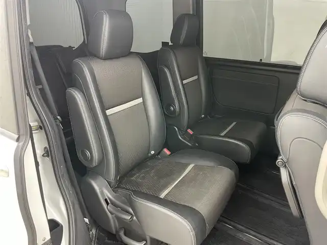 ホンダ ステップワゴン スパーダ ハイブリッド G EX ホンダセンシング 岡山県 2019(平31)年 5.7万km プラチナホワイトパール 純正10インチナビ/（CD/DVD/BT/フルセグTV/HDMI）/フリップダウンモニター/アラウンドビューモニター/両側パワースライドドア/シートヒーター(D/N)/ビルトインETC/レーダークルーズコントロール/LEDヘッドライト/LEDフォグランプ/オートライト/オートブレーキホールド/純正ドライブレコーダー（前）/純正フロアマット/純正ドアバイザー/TVキャンセラー/ISOFIX/リアサーキュレーター/後席サンシェイド/ステアリングスイッチ/チルトステアリング/シートリフター/シートバックテーブル/ウインカーミラー/ドアバイザー/取扱説明書