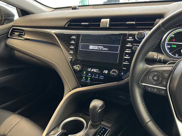 トヨタ カムリ WSレザーパッケージ 岐阜県 2019(令1)年 1.7万km アティチュードブラックマイカ プリクラッシュセーフティ/車線逸脱警報/ブラインドスポットモニター/オートマチックハイビーム/LEDヘッドライト/純正ナビ/フルセグTV/DVD/バックカメラ/クリアランスソナー/黒革シート/前席シートヒーター/レーダークルーズコントロール/純正18インチアルミホイール/ヘッドアップディスプレイ/パドルシフト/前後ドライブレコーダー/ビルトインETC2.0/パドルシフト/サイドシルスポイラー/トランクスポイラー