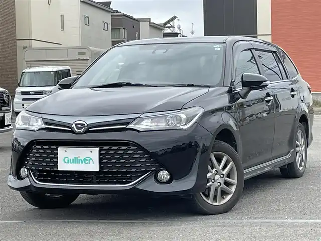 トヨタ カローラ フィールダー 1．5G ダブルバイビー 道央・札幌 2015(平27)年 9.6万km ブラックマイカ ４WD/寒冷地仕様/社外メモリーナビ/CD/DVD/BT/フルセグ/社外後席モニター/衝突被害軽減ブレーキ/横滑り防止装置/レーンキープアシスト/バックカメラ/ビルトインETC/ワイパーデアイサー/ハーフレザーシート/革巻きステアリング/ステアリングリモコン/プッシュスタート/スマートキー/LEDヘッドライト/オートライト/オートハイビーム/フォグランプ/電動格納ミラー/ウィンカーミラー/純正フロアマット/ドアバイザー/純正エンジンスターター/社外AW付冬タイヤ積込/175/65/R15/2021年/山6mm