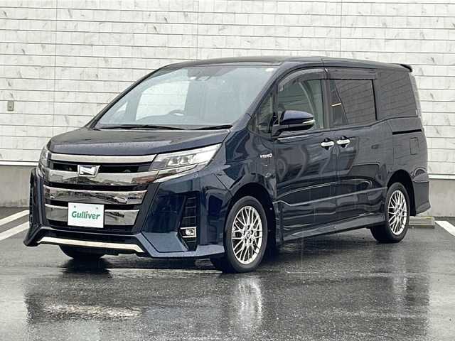 トヨタ ノア ハイブリッド Si ダブルバイビーⅡ 山形県 2020(令2)年 4.5万km ブラッキッシュアゲハガラスフレーク 禁煙車/Toyota Safety Sense C/・プリクラッシュセーフティ/・レーンディパーチャーアラート/・オートマチックハイビーム/・先行車発進告知（発進遅れ告知機能）/クルーズコントロール/アルパイン9インチナビ/CD.DVD.BT.USB.HDMI.SD/フルセグ/バックカメラ/アルパインフリップダウンモニター/両側パワースライドドア/ハーフレザーシート/シートヒーター/ドライブレコーダー/LEDヘッドライト/シートバックテーブル/ロールアップサンシェード/プッシュスタート/スマートキー