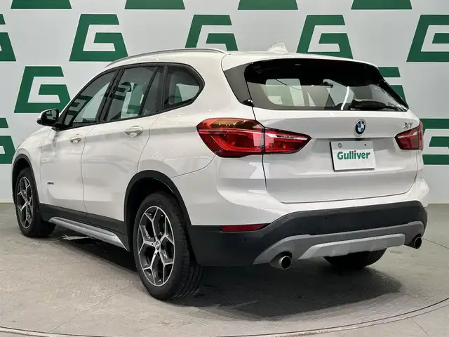 ＢＭＷ Ｘ１ xDrive 20i Xライン 鹿児島県 2017(平29)年 2.8万km アルピンホワイトⅢ 純正HDDナビ/（CD/DVD/Bluetooth/AUX/AM/FM）/ETC/社外前後ドライブレコーダー/リアビューカメラ/パーキングアシスト/ステアリングリモコン/クルーズコントロール/ハーフレザーシート/パワーバックドア/純正LEDヘッドライト/フロントフォグランプ/オートライト/衝突被害軽減ブレーキ/車線逸脱警報機能/前車接近警報機能/ダイナミックトラクションコントロール/サーボトロニック/レーンディパーチャーウォーニング/エコプロ・コンフォート・スポーツモード/前後コーナーセンサー/ルーフレール/電動パーキングブレーキ/純正フロアマット/純正18インチアルミ