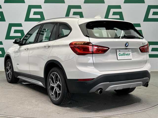 ＢＭＷ Ｘ１ xDrive 20i Xライン 鹿児島県 2017(平29)年 2.8万km アルピンホワイトⅢ 純正HDDナビ/（CD/DVD/Bluetooth/AUX/AM/FM）/ETC/社外前後ドライブレコーダー/リアビューカメラ/パーキングアシスト/ステアリングリモコン/クルーズコントロール/ハーフレザーシート/パワーバックドア/純正LEDヘッドライト/フロントフォグランプ/オートライト/衝突被害軽減ブレーキ/車線逸脱警報機能/前車接近警報機能/ダイナミックトラクションコントロール/サーボトロニック/レーンディパーチャーウォーニング/エコプロ・コンフォート・スポーツモード/前後コーナーセンサー/ルーフレール/電動パーキングブレーキ/純正フロアマット/純正18インチアルミ