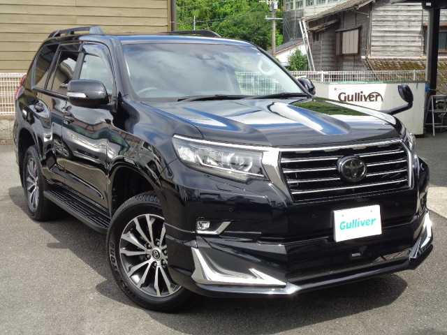 トヨタ ランドクルーザー プラド TX Lパッケージ 鹿児島県 2018(平30)年 0.4万km アティチュードブラックマイカ ワンオーナー/モデリスタエアロ/モデリスタマフラー/純正19インチAW/SOREXヒッチメンバー/サンルーフ/黒革シート(前席パワーシート)/温冷エアシート/横フィングリル/純正ナビ(NSZT-Y66T)/ブルートゥース、フルセグ/DVD再生、バックカメラ/レーダークルーズコントロール/オートハイビーム/カーテンエアバッグ/登録時走行距離3419km/ETC/取説、ナビ取説、オフロード取説/保証書、スマートキー2個あり