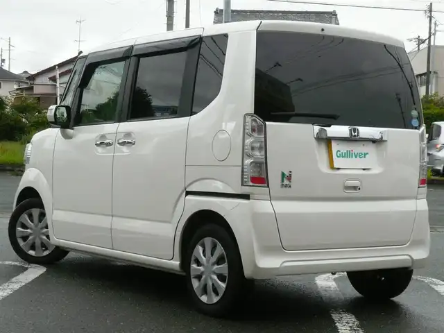 ホンダ Ｎ ＢＯＸ G ターボ SSパッケージ 静岡県 2017(平29)年 7.4万km プレミアムホワイトパールⅡ 禁煙車/純正Gathersナビ(VXM-174CSi)/両側パワースライドドア/バックカメラ/シティブレーキアクティブシステム/(低速域衝突軽減ブレーキ＋誤発進抑制機能)/クルーズコントロール/シートヒーター/オートライト/キセノンライト/スマートキー/ETC/新車保証書