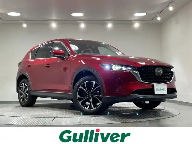 マツダ ＣＸ－５ XD Lパッケージ 愛知県 2022(令4)年 2.7万km ソウルレッドクリスタルM 純正１０．２５インチナビ/３６０°ビュー・モニター/衝突軽減ブレーキ/レーダークルーズコントロール/車線逸脱警報/クリアランスソナー/ブラインドスポットモニター/パワーバックドア/ヘッドアップディスプレイ/電動パーキングブレーキ/ブレーキホールド/パドルシフト/レザーシート/パワーシート【シートメモリー機能付】/シートヒーター/ハンドルヒーター/ドライブレコーダー/ETC/USB入力端子/アイドリングストップ/ISOFIX/純正フロアマット/純正19インチアルミホイール