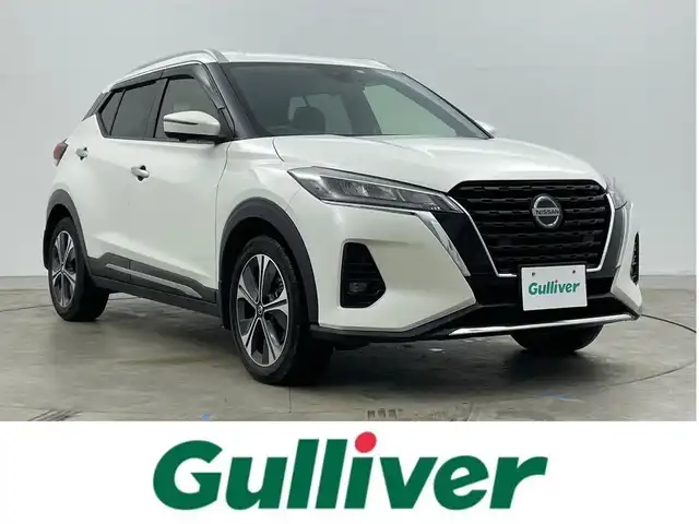 日産 キックス X 岡山県 2021(令3)年 4.7万km ブリリアントホワイトパール 純正９インチナビ/【Bluetooth/フルセグTV/CD/DVD】/型番:MM319D-L/プロパイロット/アラウンドビューモニター/ビルトインＥＴＣ　/ＬＥＤヘッドライト　/純正ドライブレコーダー（前）/デジタルインナーミラー　/コーナーセンサー（前後）/オートハイビーム　/オートライト/アイドリングストップ/禁煙車/オートブレーキホールド/純正17インチアルミホイール/ナビ取扱説明書