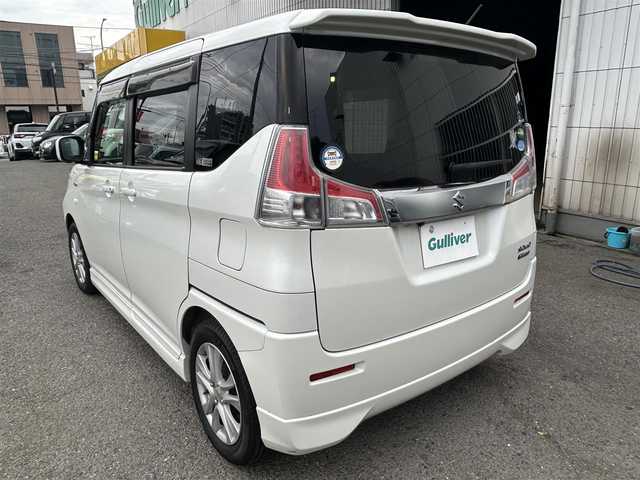 スズキ ソリオ HV MX Dカメラ ブレーキS 神奈川県 2016(平28)年 1.6万km ピュアホワイトP ・社外ナビ（AM、FM、CD、DVD、ブルートゥース、フルセグTV）/・純正フロアマット/・ETC/・ドライブレコーダー/・電動格納ミラー/・追従機能なしクルーズコントロール/・車線逸脱防止機能/・衝突警報ブレーキ/・アイドリングストップ/・横滑り防止機能/・ハロゲンヘッドライト/・フォグランプ/・盗難防止機能装置/・プッシュスタート（スマートキー）/・取扱説明書/・保証書