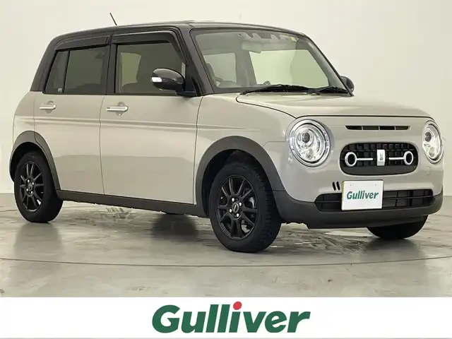 スズキ ラパン ＬＣ X 滋賀県 2023(令5)年 3.4万km フォーンベージュメタリック/アーバンブラウン 2トーン 禁煙車/純正ディスプレイオーディオ/・Bluetooth/USB//バックカメラ/ハーフレザーシート/シートヒーター/LEDヘッドライト/コーナーセンサー/レーンキープアシスト/衝突軽減ブレーキ/純正ドライブレコーダー/スマートキー/プッシュスタート/Wエアバック