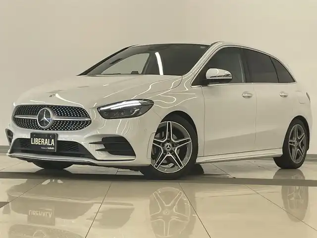 メルセデス・ベンツ Ｂ２００ｄ AMGライン 岡山県 2019(令1)年 3.7万km デジタルホワイト レザーエクスクルーシブパッケージ/・2トーン本革シート（赤黒）/・64色アンビエントライト/ナビゲーションパッケージ/レーダーセーフティーパッケージ/リアカメラ/パーキングアシスト/LEDヘッドライト/AHB/オートライト/パワーシート/シートヒーター/ACC/SOSコールシステム/ESP/アクティブステアリングアシスト/ドラレコ（F/R）/道路標識アシスト/アクティブレーンキーピングアシスト/アクティブブレーキアシスト/BSA/レーンチェンジアシスト/アテンションアシスト