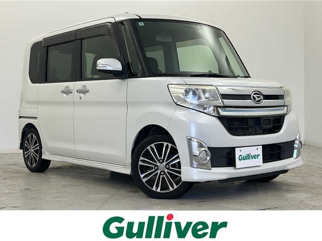 ダイハツ タント カスタム RS SA 宮城県 2014(平26)年 10万km パールホワイトⅢ 禁煙車/スマートアシスト/・衝突回避支援ブレーキ機能/純正8インチSDナビ/・BT/AM/FM/CD/DVD/SD/USB/iPod/バックカメラ/フルセグTV/ETC/ドライブレコーダー/両側パワースライドドア/革巻きステアリング/ステアリングスイッチ/プッシュスタート/スマートキー/後席ロールサンシェード/シートバックテーブル/純正15インチアルミホイール/純正フロアマット/純正ドアバイザー/LEDヘッドライト/フォグランプ/冬タイヤ社外アルミ積み込み（155/65/14）/アイドリングストップ/横滑り防止装置