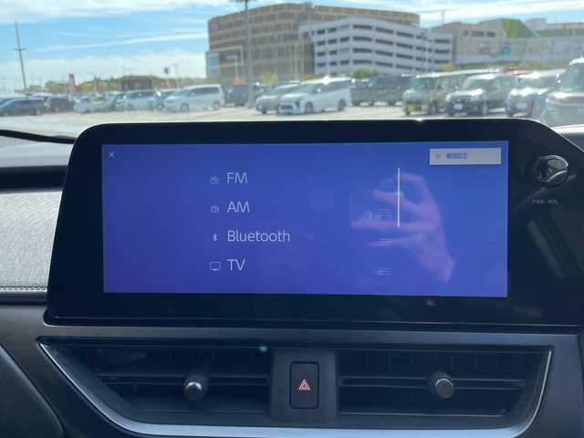 レクサス ＵＸ 250h バージョンL 愛知県 2023(令5)年 2万km ソニックチタニウム レクサスセーフティセンス/純正12.3型ディスプレイオーディオナビ/三眼LEDヘッドライト/全方位カメラ/本革レザー/レーダークルーズコントロール/シートヒーター/エアシート/バックカメラ/電動リアゲート/パワーシート/コーナーセンサー/純正アルミホイール/ETC2.0/ブラインドスポットモニター/ステアリングヒーター/レーンキープアシスト/オートマチックハイビーム/ドライブレコーダー/衝突軽減システム/フルセグ/Bluetooth/ステアリングスイッチ/スマートキー/プッシュスタート