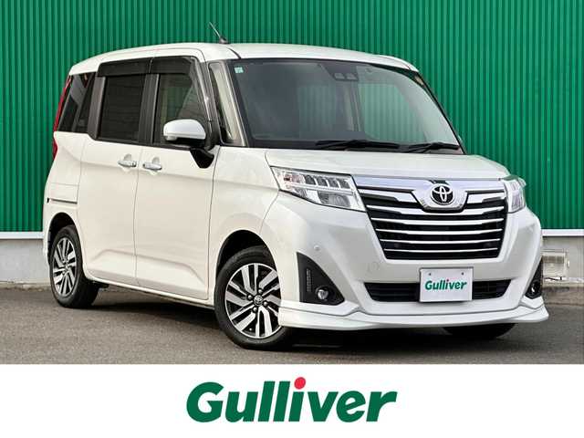 トヨタ ルーミー カスタムG 宮城県 2019(平31)年 6.2万km パールホワイトⅢ コンフォートパッケージ/・シートヒーター（運転席/助手席）/・シートバックテーブル（運転席/助手席）/＝＝＝/スマートアシスト3/・衝突回避支援ブレーキ機能/・衝突警報機能/・車線逸脱警報機能/・誤発進抑制制御機能/・先行車発進お知らせ機能/・オートハイビーム/・コーナーセンサー/純正9インチナビ（NSZT-Y68T）/・CD/DVD/Bluetooth/フルセグTV/バックカメラ/ビルトインETC/ドライブレコーダー/両側パワースライドドア/クルーズコントロール/ステアリングスイッチ/LEDオートヘッドランプ/フォグランプ/革巻きステアリング/前席シートヒーター/スマートキー＆プッシュスタート/スペアキー/電動格納ミラー/純正14インチAW/フロアマット/ドアバイザー/取扱説明書/保証書