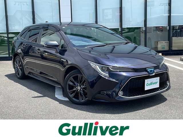 トヨタ カローラツーリング ハイブリッド ダブルバイビー 岐阜県 2020(令2)年 5.2万km スパークリングブラックパールクリスタルシャイン ドアバイザー　/クルーズコントロール追従機能付き　/ドライブレコーダー（前後）　/スマートキー　/スペアキー　/コーナーセンサー（前後）純正ナビ /レーンキープアシスト/LEDライト /バックモニター/純正アルミホイール /衝突被害軽減システム /ETC/純正オーディオ/純正フロアマット/パワーステアリング/パワーウィンドウ/Bluetooth接続/ABS/横滑り防止装置/盗難防止装置/オートライト/オートマチックハイビーム/カーテンエアバッグ