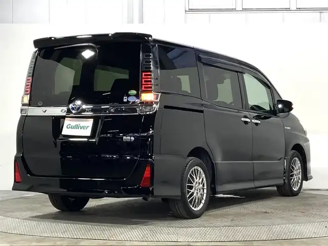 トヨタ ヴォクシー ハイブリッド ZS 煌Ⅱ 大阪府 2020(令2)年 3.2万km ブラック ALPINE9incナビ(フルセグ/DVD再生/Bluetooth) バックカメラ 後席モニター ETC 両側パワースライドドア 衝突軽減 クルコン トヨタセーフティセンス シートヒーター ドラレコ
