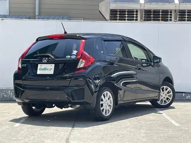 ホンダ フィット 13G Fパッケージ 青森県 2015(平27)年 5万km クリスタルブラックパール 4WD/ワンオーナー/寒冷地仕様/純正メモリナビ/AM/FM/CD/DVD/USB/BT/フルセグ/ＥＴＣ/アイドリングストップ/横滑り防止機能/ドアバイザー/電格ミラー/スペアキー/純正フロアマット/冬タイヤ積み込み有/保証書/取扱説明書/記録簿
