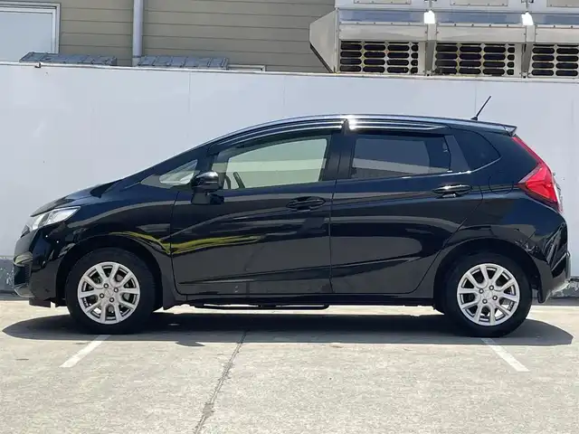 ホンダ フィット 13G Fパッケージ 青森県 2015(平27)年 5万km クリスタルブラックパール 4WD/ワンオーナー/寒冷地仕様/純正メモリナビ/AM/FM/CD/DVD/USB/BT/フルセグ/ＥＴＣ/アイドリングストップ/横滑り防止機能/ドアバイザー/電格ミラー/スペアキー/純正フロアマット/冬タイヤ積み込み有/保証書/取扱説明書/記録簿