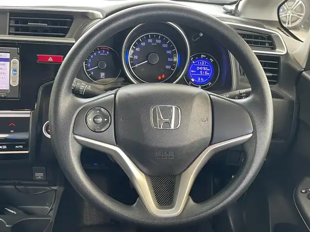 ホンダ フィット 13G Fパッケージ 青森県 2015(平27)年 5万km クリスタルブラックパール 4WD/ワンオーナー/寒冷地仕様/純正メモリナビ/AM/FM/CD/DVD/USB/BT/フルセグ/ＥＴＣ/アイドリングストップ/横滑り防止機能/ドアバイザー/電格ミラー/スペアキー/純正フロアマット/冬タイヤ積み込み有/保証書/取扱説明書/記録簿