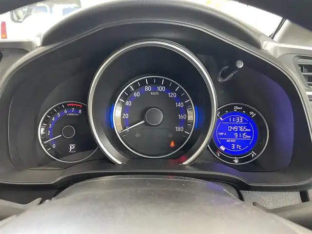 ホンダ フィット 13G Fパッケージ 青森県 2015(平27)年 5万km クリスタルブラックパール 4WD/ワンオーナー/寒冷地仕様/純正メモリナビ/AM/FM/CD/DVD/USB/BT/フルセグ/ＥＴＣ/アイドリングストップ/横滑り防止機能/ドアバイザー/電格ミラー/スペアキー/純正フロアマット/冬タイヤ積み込み有/保証書/取扱説明書/記録簿
