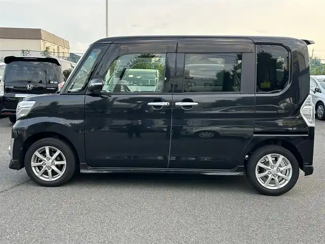 ダイハツ タント カスタム X トップED SA 東京都 2014(平26)年 6.4万km ブラックマイカメタリック (株)IDOMが運営する【じしゃロン昭島店】の自社ローン専用車両になります。/こちらは現金またはオートローンご利用時の価格です。自社ローンご希望の方は別途その旨お申付け下さい	/純正ナビ（ＳＤ・CD・ＴＶ・ＵＳＢ）/バックカメラ/衝突軽減/プッシュボタンスタート/スマートキー/片側（左後）パワースライドドア/リアブラインド/電格ミラー/ウィンカーミラー/シートリフター/AUTOライト/純正フロアマット/純正アルミホイール/純正ドアバイザー
