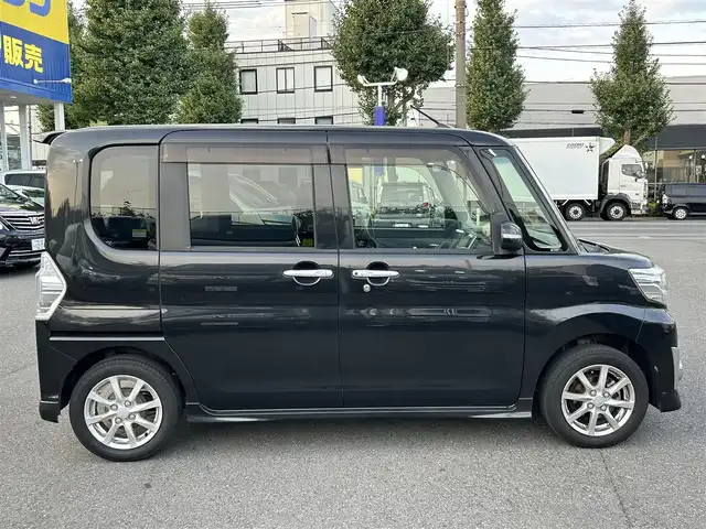 ダイハツ タント カスタム X トップED SA 東京都 2014(平26)年 6.4万km ブラックマイカメタリック (株)IDOMが運営する【じしゃロン昭島店】の自社ローン専用車両になります。/こちらは現金またはオートローンご利用時の価格です。自社ローンご希望の方は別途その旨お申付け下さい	/純正ナビ（ＳＤ・CD・ＴＶ・ＵＳＢ）/バックカメラ/衝突軽減/プッシュボタンスタート/スマートキー/片側（左後）パワースライドドア/リアブラインド/電格ミラー/ウィンカーミラー/シートリフター/AUTOライト/純正フロアマット/純正アルミホイール/純正ドアバイザー