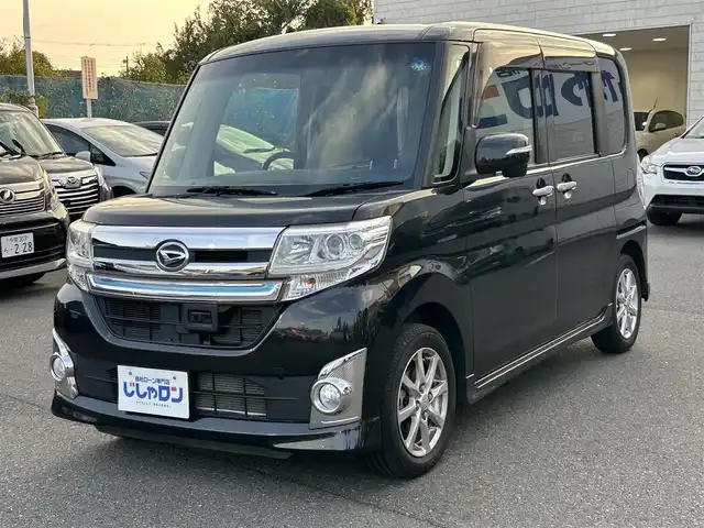 ダイハツ タント カスタム X トップED SA 東京都 2014(平26)年 6.4万km ブラックマイカメタリック (株)IDOMが運営する【じしゃロン昭島店】の自社ローン専用車両になります。/こちらは現金またはオートローンご利用時の価格です。自社ローンご希望の方は別途その旨お申付け下さい	/純正ナビ（ＳＤ・CD・ＴＶ・ＵＳＢ）/バックカメラ/衝突軽減/プッシュボタンスタート/スマートキー/片側（左後）パワースライドドア/リアブラインド/電格ミラー/ウィンカーミラー/シートリフター/AUTOライト/純正フロアマット/純正アルミホイール/純正ドアバイザー