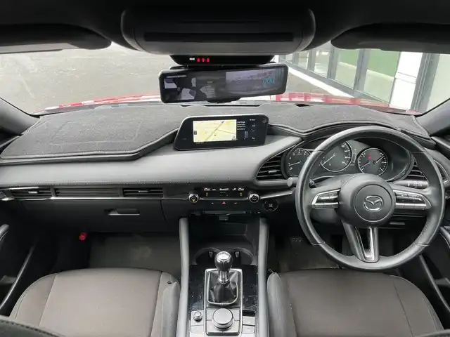 マツダ マツダ３ファストバック 15S ツーリング 道央・札幌 2020(令2)年 4.4万km ソウルレッドクリスタルM ワンオーナー/6速MT/純正メーカーナビ/CD/DVD/BT/フルセグ/衝突被害軽減ブレーキ/横滑り防止装置/レーダークルーズコントロール/クリアランスソナー/アラウンドビューモニター/ドライブレコーダー/デジタルインナーミラー/アイドリングストップ/革巻きステアリング/ステアリングリモコン/電動パーキング/オートブレーキホールド/プッシュスタート/スマートキー/LEDヘッドライト/オートライト/オートハイビーム/電動格納ミラー/ウィンカーミラー/フロアマット/スペアキー/純正AW付冬タイヤ積込/215/45/R18/2021年/山8mm