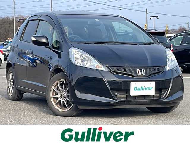 ホンダ フィット G スマートセレ ファインスタイル 道央・札幌 2013(平25)年 8.8万km クリスタルブラックパール ワンオーナー/社外メモリーナビ/AM/FM/CD/SD/ワンセグ/横滑り防止装置/ビルトインETC/ワイパーデアイサー/ステアリングリモコン/スマートキー/キセノンヘッドライト/オートライト/電動格納ミラー/ヒーテッドドアミラー/ウィンカーミラー/純正フロアマット/ドアバイザー/ECON
