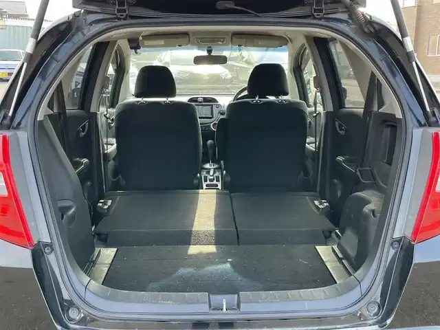 ホンダ フィット G スマートセレ ファインスタイル 道央・札幌 2013(平25)年 8.8万km クリスタルブラックパール ワンオーナー/社外メモリーナビ/AM/FM/CD/SD/ワンセグ/横滑り防止装置/ビルトインETC/ワイパーデアイサー/ステアリングリモコン/スマートキー/キセノンヘッドライト/オートライト/電動格納ミラー/ヒーテッドドアミラー/ウィンカーミラー/純正フロアマット/ドアバイザー/ECON