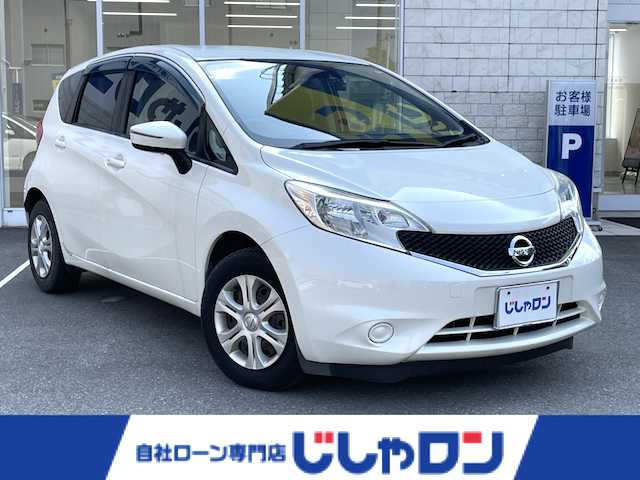 日産 ノート X DIG－S 福井県 2016(平28)年 7.7万km ブリリアントホワイトパール (株)IDOMが運営する【じしゃロン福井店】の自社ローン専用車両になりますこちらは現金またはオートローンご利用時の価格です。自社ローンご希望の方は別途その旨お申付け下さい/純正SDナビ/Bluetooth/フルセグTV/CD/DVD/バックカメラ/衝突被害軽減システム/レーンキープアシスト/前後ドライブレコーダー/アイドリングストップ/ETC/オートライト/ステアリングスイッチ/ドアバイザー/プッシュスタート/スマートキー/スペアキー/電動格納ミラー/ウインカーミラー/保証書、取扱説明書