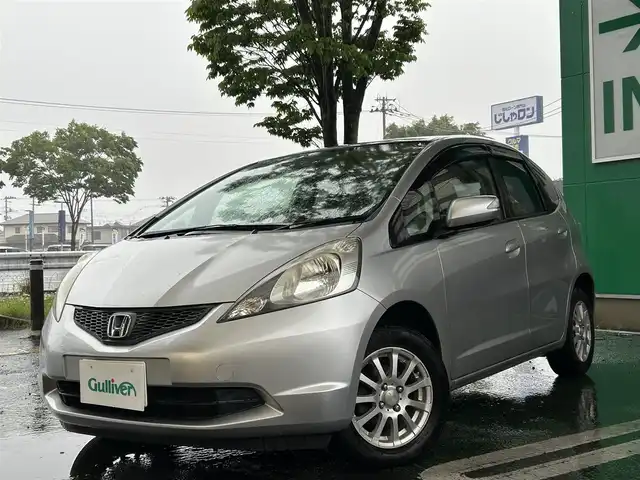 ホンダ フィット G 宮城県 2010(平22)年 8.7万km アラバスターシルバーメタリック ワンオーナー/オーディオ再生(CD/AUX/AM・FM)/純正フロアマット/社外アルミホイール14インチ