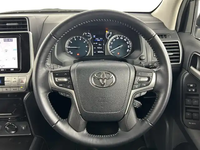 トヨタ ランドクルーザー プラド TX Lパッケージ ブラックED 愛知県 2021(令3)年 5.9万km グレーメタリック ブラックパッケージ/・漆黒メッキフロントグリル/・ピアノブラック加飾LEDフォグランプ/・漆黒メッキバックドアガーニッシュ/・ピアノブラックルーフレール/・ブラック塗装18インチアルミホイール/・ブラック革シート/・ブラックシフトパネル/純正9インチSDナビ/（Bluetooth/フルセグ/バックカメラ/DVD/SD録音）/ビルトインETC/バグガード/セーフティセンス/・プリクラッシュセーフティ/・レーンディパーチャーアラート/・オートマチックハイビーム/・レーダークルーズコントロール/・ロードサインアシスト/トラクションコントロール/ヒルスタートアシスト/LEDヘッドランプ/革巻きステアリング/前席パワーシート/前席快適温熱シート/トノカバー/スマートキー/プッシュスタート