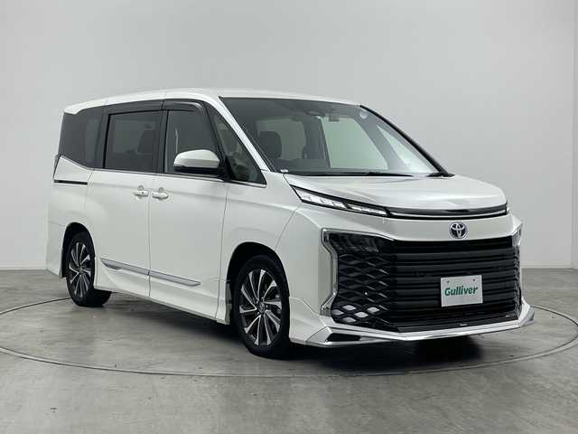 トヨタ ヴォクシー ハイブリッド S－Z 群馬県 2022(令4)年 2.3万km ホワイトパールクリスタルシャイン モデリスタエアロ　純正メーカーナビ　純正１４型後部席モニター　快適便利パッケージ　電動リアゲート　ステアリングヒーター　ユニバーサルステップ　両側電動スライドドア　ビルトインＥＴＣ２．０　禁煙車