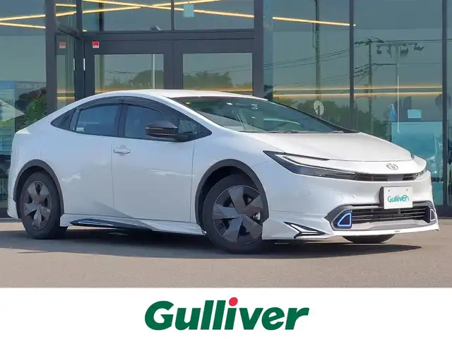 トヨタ プリウス U 東京都 2023(令5)年 3.8万km プラチナホワイトパールマイカ モデリスタネオアドバンススタイル/パノラミックビューモニター/純正ディスプレイオーディオ/ドライブレコーダー/ビルトインETC2.0/シートヒーター/トヨタセーフティセンス/プリクラッシュセーフティ/トレーシングアシスト/レーダークルーズコントロール/オートマチックハイビーム/ブラインドスポットモニター/コーナーセンサー/LEDヘッドライト/AC100V
