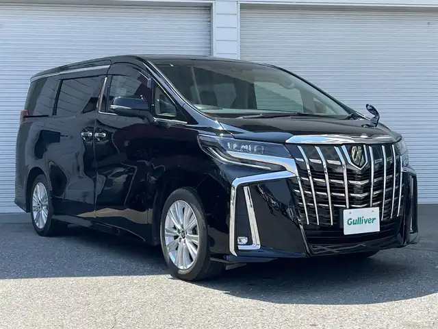 トヨタ アルファード S Aパッケージ 高知県 2019(令1)年 0.7万km ブラック 純正ナビ/　Bluetooth/フルセグ/　CD/DVD/AM/FM/ビルトインETC/両側パワースライドドア/LEDヘッドライト/3列目シート/オットマン/バックカメラ/プッシュスタート/スマートキー/純正18インチアルミホイール/フロアマット/コーナーセンサー/MTモード付AT/オートマチックハイビーム/オートライト/衝突被害軽減システム/盗難防止装置