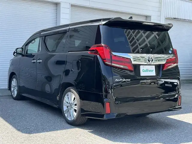 トヨタ アルファード S Aパッケージ 高知県 2019(令1)年 0.7万km ブラック 純正ナビ/　Bluetooth/フルセグ/　CD/DVD/AM/FM/ビルトインETC/両側パワースライドドア/LEDヘッドライト/3列目シート/オットマン/バックカメラ/プッシュスタート/スマートキー/純正18インチアルミホイール/フロアマット/コーナーセンサー/MTモード付AT/オートマチックハイビーム/オートライト/衝突被害軽減システム/盗難防止装置