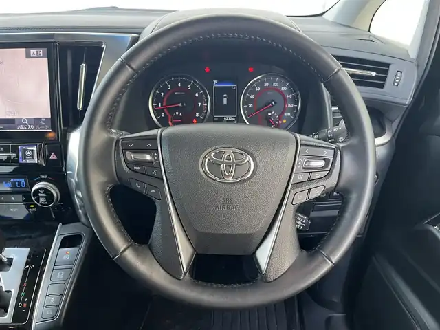トヨタ アルファード S Aパッケージ 高知県 2019(令1)年 0.7万km ブラック 純正ナビ/　Bluetooth/フルセグ/　CD/DVD/AM/FM/ビルトインETC/両側パワースライドドア/LEDヘッドライト/3列目シート/オットマン/バックカメラ/プッシュスタート/スマートキー/純正18インチアルミホイール/フロアマット/コーナーセンサー/MTモード付AT/オートマチックハイビーム/オートライト/衝突被害軽減システム/盗難防止装置