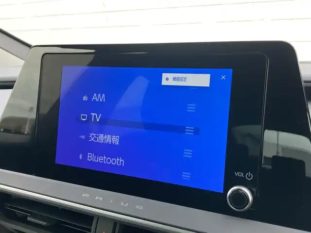 トヨタ プリウス U 静岡県 2023(令5)年 1.5万km アティチュードブラックマイカ トヨタセーフティセンス/純正8インチディスプレイオーディオ/　AM FM Bluetooth Miracast/フルセグTV/パノラミックビューモニター/ステアリングヒーター/ETC2.0/ブラインドスポットモニタリング/電動パーキングブレーキ/オートブレーキホールド/LEDヘッドライト/AC100V/純正フロアマット/スマートキー