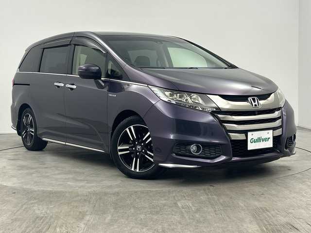 ホンダ オデッセイ ハイブリッド アブソルートセンシングEXパック 三重県 2016(平28)年 5.4万km プレミアムスパイスパープルP ホンダセンシング/●衝突軽減ブレーキ 〈CMBS〉/●歩行者事故低減ステアリング＊/●ACC 〈アダプティブ・クルーズ・コントロール〉/●LKAS 〈車線維持支援システム〉/●路外逸脱抑制機能/●誤発進抑制機能/●先行車発進お知らせ機能/●標識認識機能/純正インターナビ/・AM/FM/CD/DVD/USB/Bluetooth/iPod/フルセグ/HDMI/レーダークルーズコントロール/マルチビューカメラシステム/ブラインドスポットインフォメーション/スマートパーキングアシスト/純正フリップダウンモニター/本革シート/前席シートヒーター/運転席パワーシート/両側パワースライドドア/本革シート/ETC/LEDヘッドライト/アクティブコーナリングライト/AC100V1500W電源/純正１７インチAW