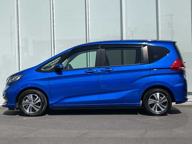 ホンダ フリード ハイブリット G 神奈川県 2023(令5)年 1.1万km プレミアムクリスタルブルークリスタル 純正SDナビ　iPod/Bluetooth/CD/DVD/ワンセグTV /両側パワースライドドア /バックカメラ　/レーダークルーズコントロール　/前後ドライブレコーダー　/コーナーセンサー　/ビルトインETC　/前席シートヒーター/純正アルミホイール　/純正フロアマット