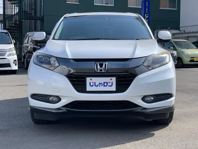 ホンダ ヴェゼル ハイブリッド X 福井県 2015(平27)年 11.3万km ホワイトオーキッドパール (株)IDOMが運営する【じしゃロン福井店】の自社ローン対象車両になります。こちらは現金またはオートローンご利用時の価格です。自社ローンご希望の方は別途その旨お申付け下さい/純正ナビ（CD・DVD・BT接続可）/フルセグテレビ/バックカメラ/ETC/クルーズコントロール/LEDヘッドライト