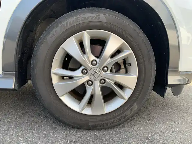 ホンダ ヴェゼル ハイブリッド X 福井県 2015(平27)年 11.3万km ホワイトオーキッドパール (株)IDOMが運営する【じしゃロン福井店】の自社ローン対象車両になります。こちらは現金またはオートローンご利用時の価格です。自社ローンご希望の方は別途その旨お申付け下さい/純正ナビ（CD・DVD・BT接続可）/フルセグテレビ/バックカメラ/ETC/クルーズコントロール/LEDヘッドライト