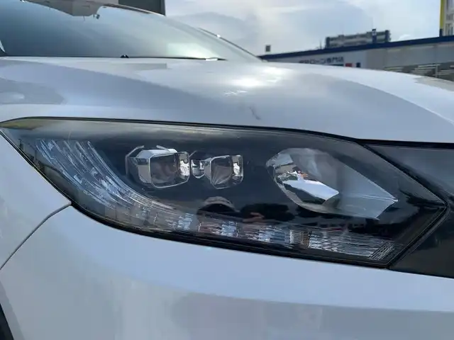 ホンダ ヴェゼル ハイブリッド X 福井県 2015(平27)年 11.3万km ホワイトオーキッドパール (株)IDOMが運営する【じしゃロン福井店】の自社ローン対象車両になります。こちらは現金またはオートローンご利用時の価格です。自社ローンご希望の方は別途その旨お申付け下さい/純正ナビ（CD・DVD・BT接続可）/フルセグテレビ/バックカメラ/ETC/クルーズコントロール/LEDヘッドライト