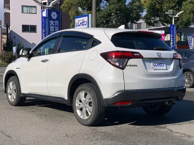 ホンダ ヴェゼル ハイブリッド X 福井県 2015(平27)年 11.3万km ホワイトオーキッドパール (株)IDOMが運営する【じしゃロン福井店】の自社ローン対象車両になります。こちらは現金ご利用時の価格です。/自社ローンご希望の方は別途その旨お申付け下さい。/純正ナビ/Bluetooth/フルセグTV/CD/DVD/バックカメラ/衝突被害軽減システム/クルーズコントロール/オートライト/ETC/純正アルミホイール/パドルシフト/電動パーキングブレーキ/ドアバイザー/ステアリングスイッチ/プッシュスタート/スマートキー/スペアキー/取扱説明書