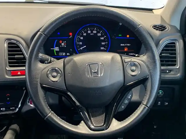 ホンダ ヴェゼル ハイブリッド X 福井県 2015(平27)年 11.3万km ホワイトオーキッドパール (株)IDOMが運営する【じしゃロン福井店】の自社ローン対象車両になります。こちらは現金ご利用時の価格です。/自社ローンご希望の方は別途その旨お申付け下さい。/純正ナビ/Bluetooth/フルセグTV/CD/DVD/バックカメラ/衝突被害軽減システム/クルーズコントロール/オートライト/ETC/純正アルミホイール/パドルシフト/電動パーキングブレーキ/ドアバイザー/ステアリングスイッチ/プッシュスタート/スマートキー/スペアキー/取扱説明書