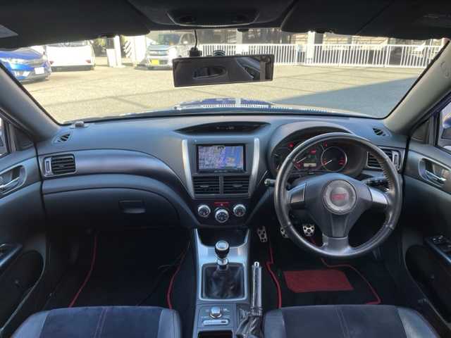 スバル インプレッサ ＷＲＸ STi 神奈川県 2012(平24)年 15.1万km WRブルーマイカ 4WDターボ/社外HDDナビ【AVIC-ZH99】/・DTV/CD/DVD/MSV/BT/バックカメラ/ハーフレザーシート/D席パワーシート/リアスポイラー/社外18インチAW【BSJ】/社外マフラー【フジツボ】/ドライブレコーダー/ETC/横滑り防止機能/革巻きステアリング/プッシュEgスタート/ストップ/スマートキー×2/純正HIDヘッドライト/フロント/バックフォグ/ターンランプ付き電動格納ドアミラー/社外フロアマット