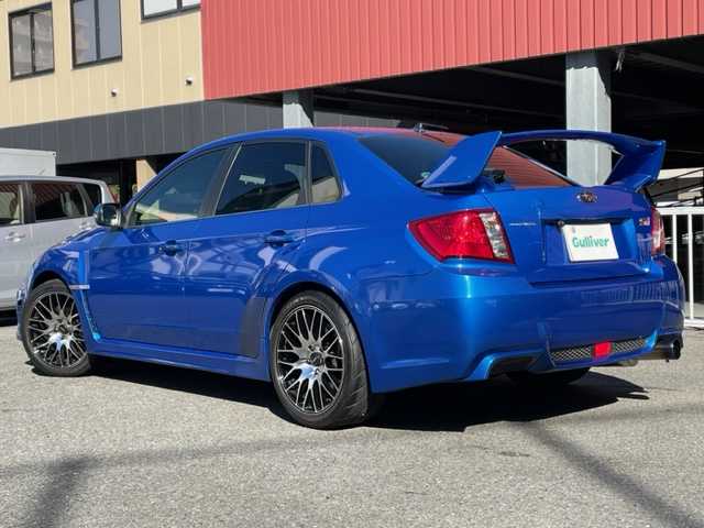 スバル インプレッサ ＷＲＸ STi 神奈川県 2012(平24)年 15.1万km WRブルーマイカ 4WDターボ/社外HDDナビ【AVIC-ZH99】/・DTV/CD/DVD/MSV/BT/バックカメラ/ハーフレザーシート/D席パワーシート/リアスポイラー/社外18インチAW【BSJ】/社外マフラー【フジツボ】/ドライブレコーダー/ETC/横滑り防止機能/革巻きステアリング/プッシュEgスタート/ストップ/スマートキー×2/純正HIDヘッドライト/フロント/バックフォグ/ターンランプ付き電動格納ドアミラー/社外フロアマット