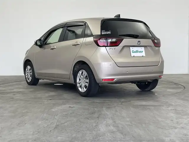 ホンダ フィット e:HEVホーム 群馬県 2023(令5)年 5.1万km 茶 社外ナビ　バックカメラ　追従式クルコン　衝突軽減システム　ホンダセンシング　横滑り防止　ＥＴＣ　オートマチックハイビーム　レーンアシスト　スマートキー　プッシュスタート　ＬＥＤヘッドライト　禁煙車
